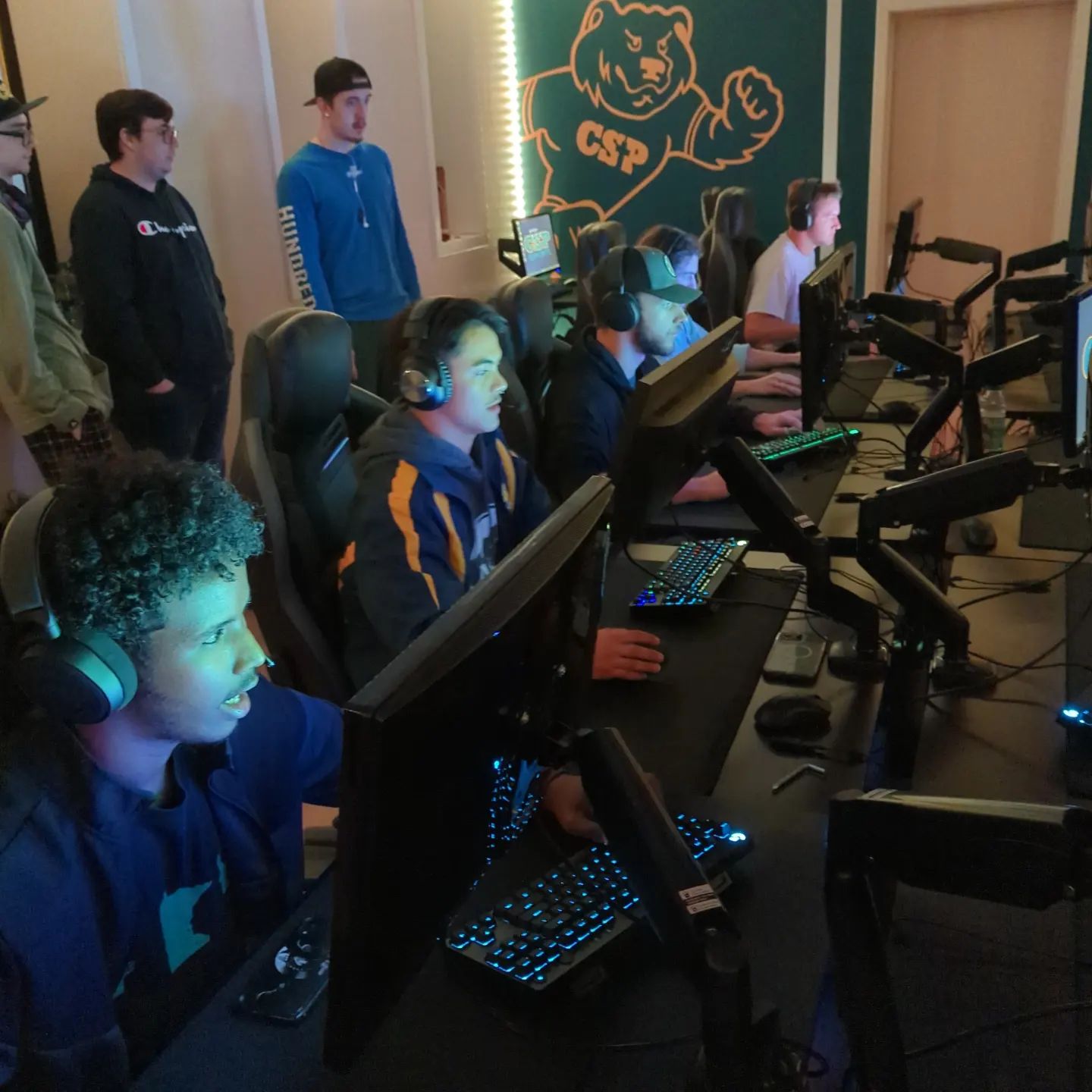 Group of Esports players competing in a match.